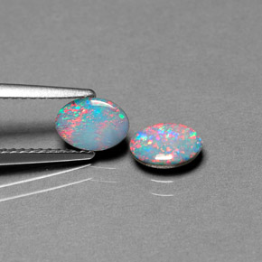 Gemas de doblete de ópalo multicolor natural de  ct, corte óvalo, opaco