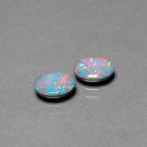 Gemas de doblete de ópalo multicolor natural de  ct, corte óvalo, opaco