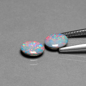 Gemas de doblete de ópalo multicolor natural de  ct, corte óvalo, opaco
