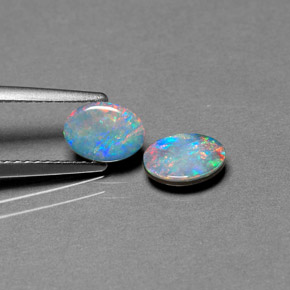 Gemas de doblete de ópalo multicolor natural de  ct, corte óvalo, opaco
