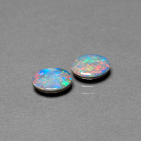 Gemas de doblete de ópalo multicolor natural de  ct, corte óvalo, opaco