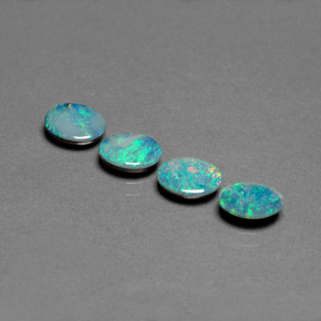 Gemas de doblete de ópalo multicolor natural de  ct, corte óvalo, opaco