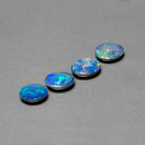 Gemas de doblete de ópalo multicolor natural de  ct, corte óvalo, opaco