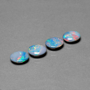 Gemas de doblete de ópalo multicolor natural de  ct, corte óvalo, opaco