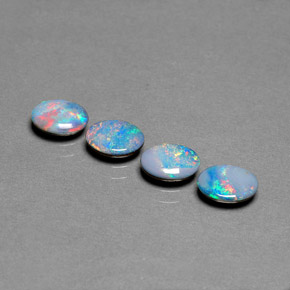 Gemas de doblete de ópalo multicolor natural de  ct, corte óvalo, opaco