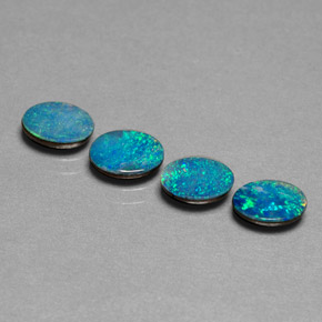 Gemas de doblete de ópalo multicolor natural de  ct, corte óvalo, opaco