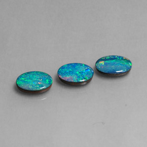 Gemas de doblete de ópalo multicolor natural de  ct, corte óvalo, opaco