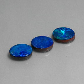 Gemas de doblete de ópalo multicolor natural de  ct, corte óvalo, opaco