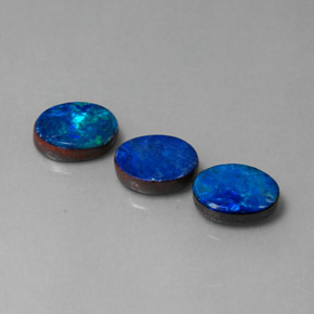 Gemas de doblete de ópalo multicolor natural de  ct, corte óvalo, opaco