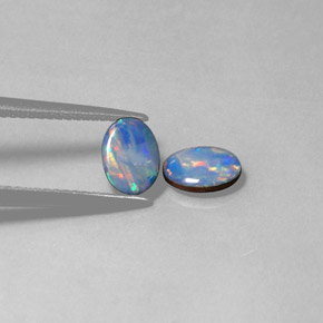 Gemas de doblete de ópalo multicolor natural de  ct, corte óvalo, opaco