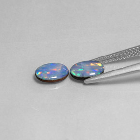 Gemas de doblete de ópalo multicolor natural de  ct, corte óvalo, opaco