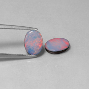 Gemas de doblete de ópalo multicolor natural de  ct, corte óvalo, opaco