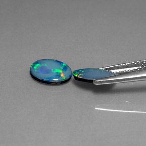 Gemas de doblete de ópalo multicolor natural de  ct, corte óvalo, opaco