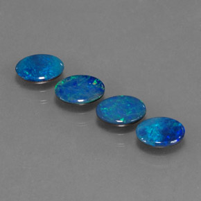 Gemas de doblete de ópalo multicolor natural de  ct, corte óvalo, opaco