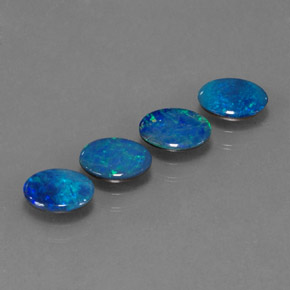Gemas de doblete de ópalo multicolor natural de  ct, corte óvalo, opaco