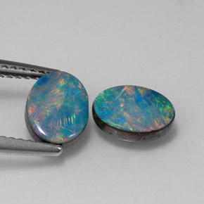 Gemas de doblete de ópalo multicolor natural de  ct, corte óvalo, opaco