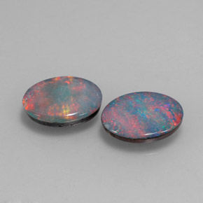 Gemas de doblete de ópalo multicolor natural de  ct, corte óvalo, opaco