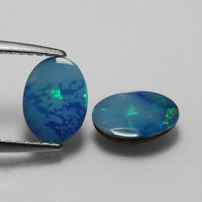 Gemas de doblete de ópalo multicolor natural de  ct, corte óvalo, opaco