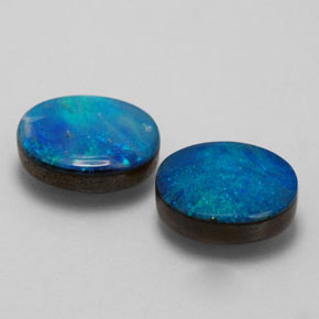 Gemas de doblete de ópalo multicolor natural de  ct, corte óvalo, opaco