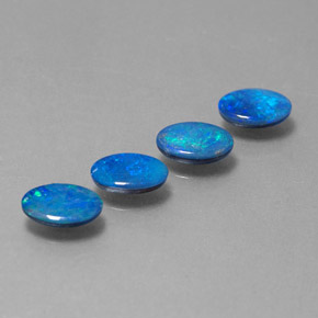 Gemas de doblete de ópalo multicolor natural de  ct, corte óvalo, opaco