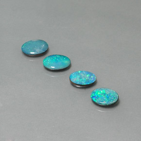 Gemas de doblete de ópalo multicolor natural de  ct, corte óvalo, opaco