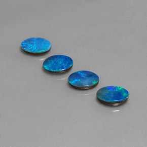 Gemas de doblete de ópalo multicolor natural de  ct, corte óvalo, opaco