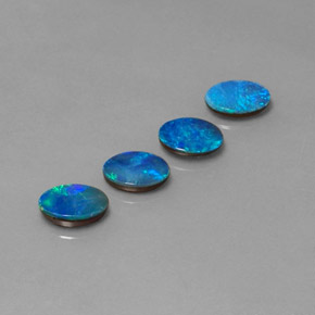 Gemas de doblete de ópalo multicolor natural de  ct, corte óvalo, opaco