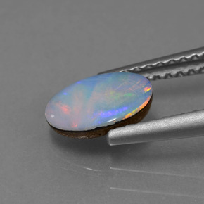 Doblete de ópalo Multicolor natural de 0.69 ct, Ovalada, Opaco