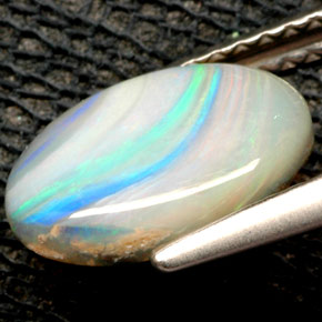 Ópalo multicolor natural de 1,32 ct, corte óvalo, opaco