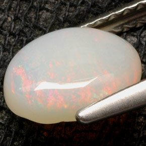 Ópalo multicolor natural de 0,94 ct, corte óvalo, opaco