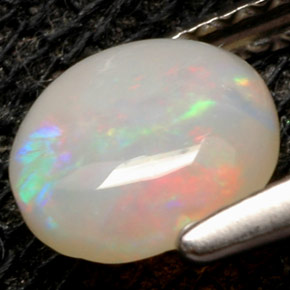 Ópalo multicolor natural de 0,52 ct, corte redondo, opaco