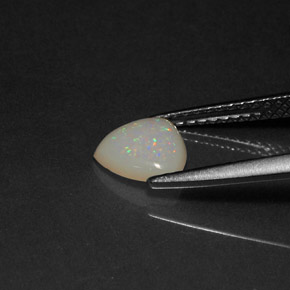 Ópalo multicolor natural de 0,56 ct, transparente, transparente / translúcido