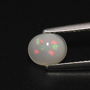 Ópalo multicolor natural de 0,70 ct, corte óvalo, translúcido