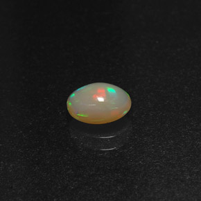 Ópalo multicolor natural de 0,58 ct, corte óvalo, translúcido