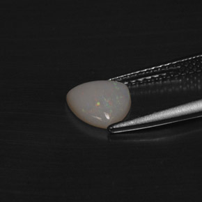 Ópalo multicolor natural de 0,60 ct, trillón, translúcido