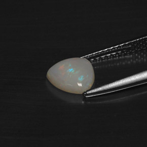 Ópalo multicolor natural de 0,69 ct, trillón, translúcido
