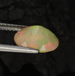 Ópalo multicolor natural de 1,57 ct, corte óvalo, translúcido