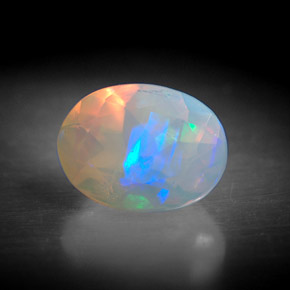 Ópalo multicolor natural de 0,91 ct, transparente, transparente / translúcido