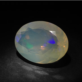 Ópalo multicolor natural de 3,63 ct, corte óvalo, transparente