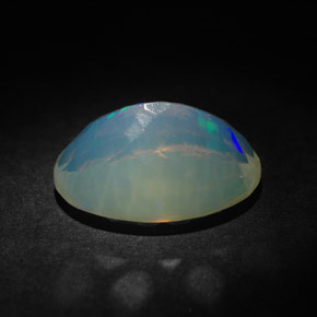 Ópalo multicolor natural de 3,63 ct, corte óvalo, transparente