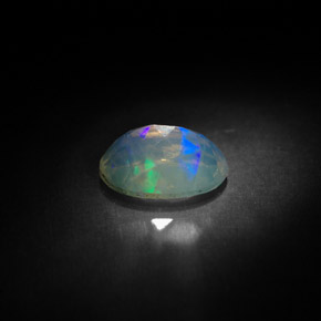 Ópalo multicolor natural de 0,83 ct, transparente, transparente / translúcido
