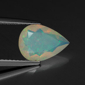 Ópalo multicolor natural de 1,28 ct, en forma de pera, transparente