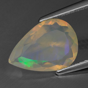 Ópalo multicolor natural de 1,54 ct, en forma de pera, transparente