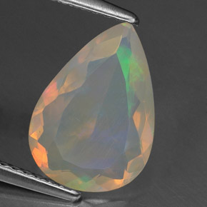 Ópalo multicolor natural de 1,54 ct, en forma de pera, transparente