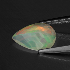 Ópalo multicolor natural de 1,01 ct, en forma de pera, transparente