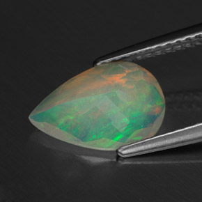 Ópalo multicolor natural de 1,26 ct, en forma de pera, transparente