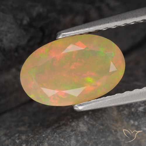 0.86ct Natural Multicolor Ópalo, Ovalada, Translúcido