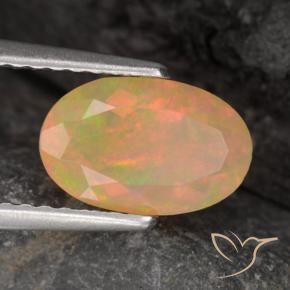 Ópalo Multicolor natural de 0.86 ct, Ovalada, Translúcido