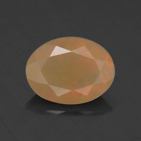 Ópalo multicolor natural de 0,69 ct, corte óvalo, translúcido