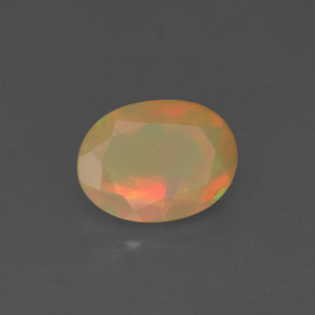 Ópalo multicolor natural de 0,69 ct, transparente, transparente / translúcido